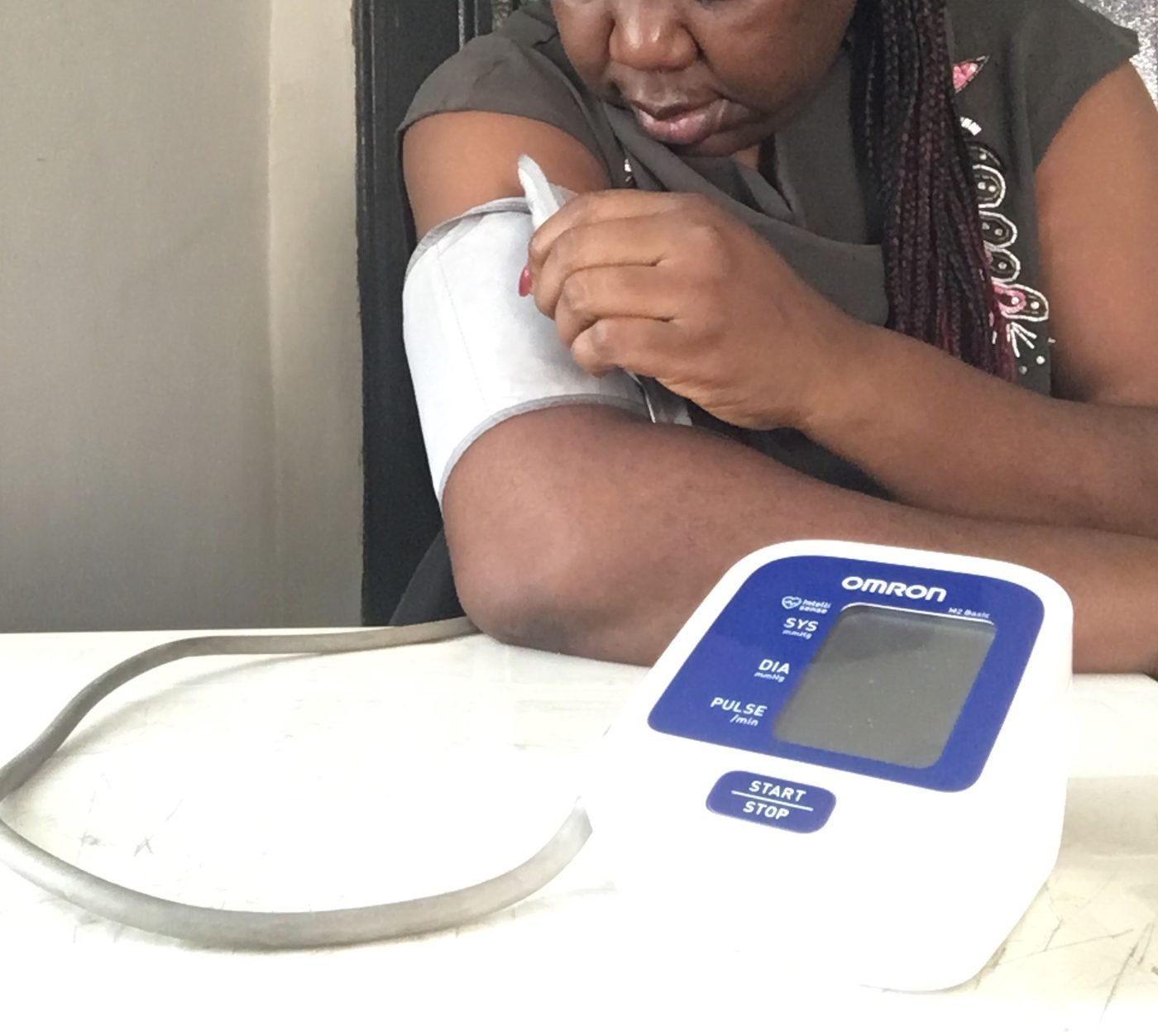 Home blood pressure check with an upper arm cuff